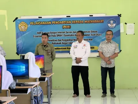 Dosen PNL Lakukan PKM Rancang Bangun Internet Server dan Implementasi Sistem E-Learning Sekolah Pada SMAN 1 Syamtalira Aron