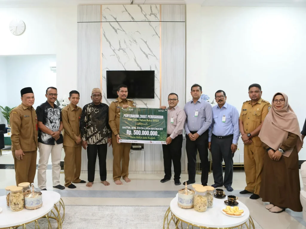 Foto: Pemerintah Kota (Pemko) Lhokseumawe menerima penyerahan zakat perusahaan dari PT. Bank Aceh Syariah (BAS) Cabang Lhokseumawe. Penyerahan zakat ini merupakan bagian dari tanggung jawab sosial perusahaan dan komitmen untuk mendukung kemaslahatan umat di Kota Lhokseumawe.