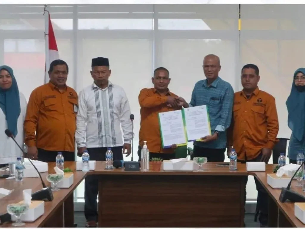 Foto: Penandatanganan kerjasama antara Panwaslih Aceh Utara  dengan BPJS Ketenagakerjaan